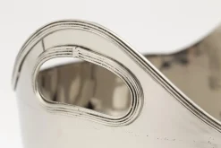 Flamant Azy, Kom, Nikkel