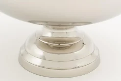 Flamant Azy, Kom, Nikkel