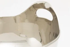 Flamant Azy, Kom, Nikkel