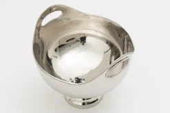 Flamant Azy, Kom, Nikkel