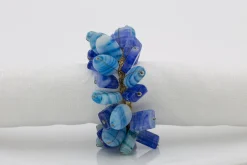 Flamant Ezana, Servetring, Kralen