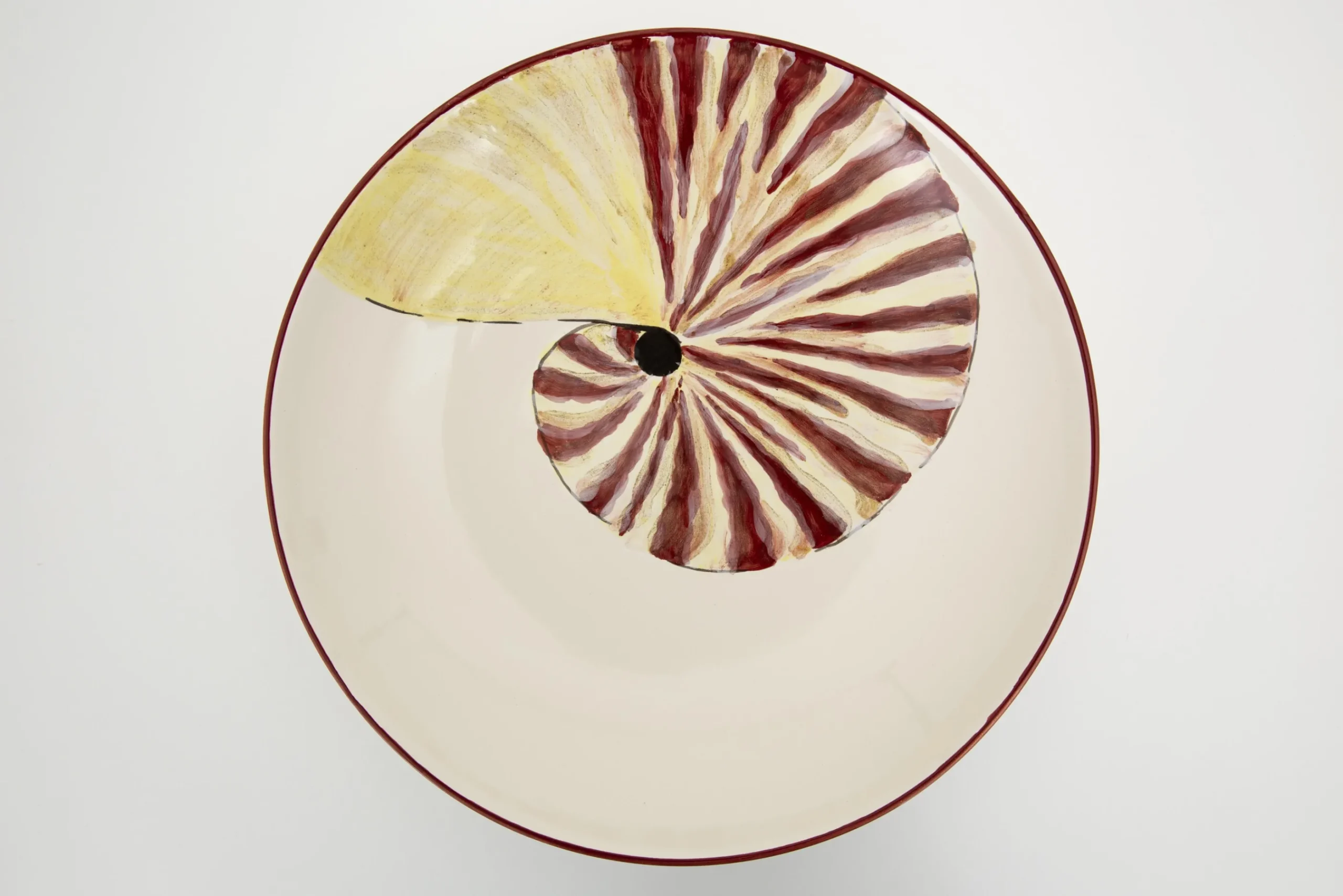 Flamant Maskorra, Kom, Schelp