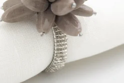 Flamant Otis, Servetring, Kralen