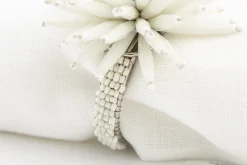 Flamant Parton, Servetring, Kralen