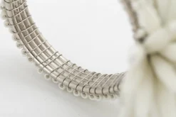 Flamant Parton, Servetring, Kralen